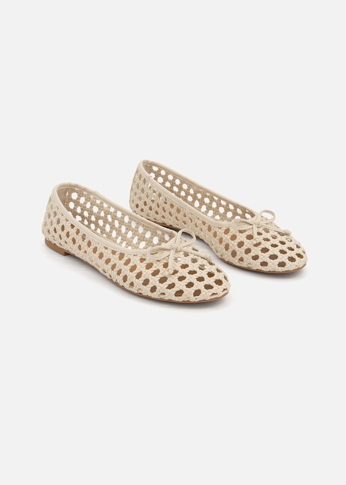 Bow Woven Pumps