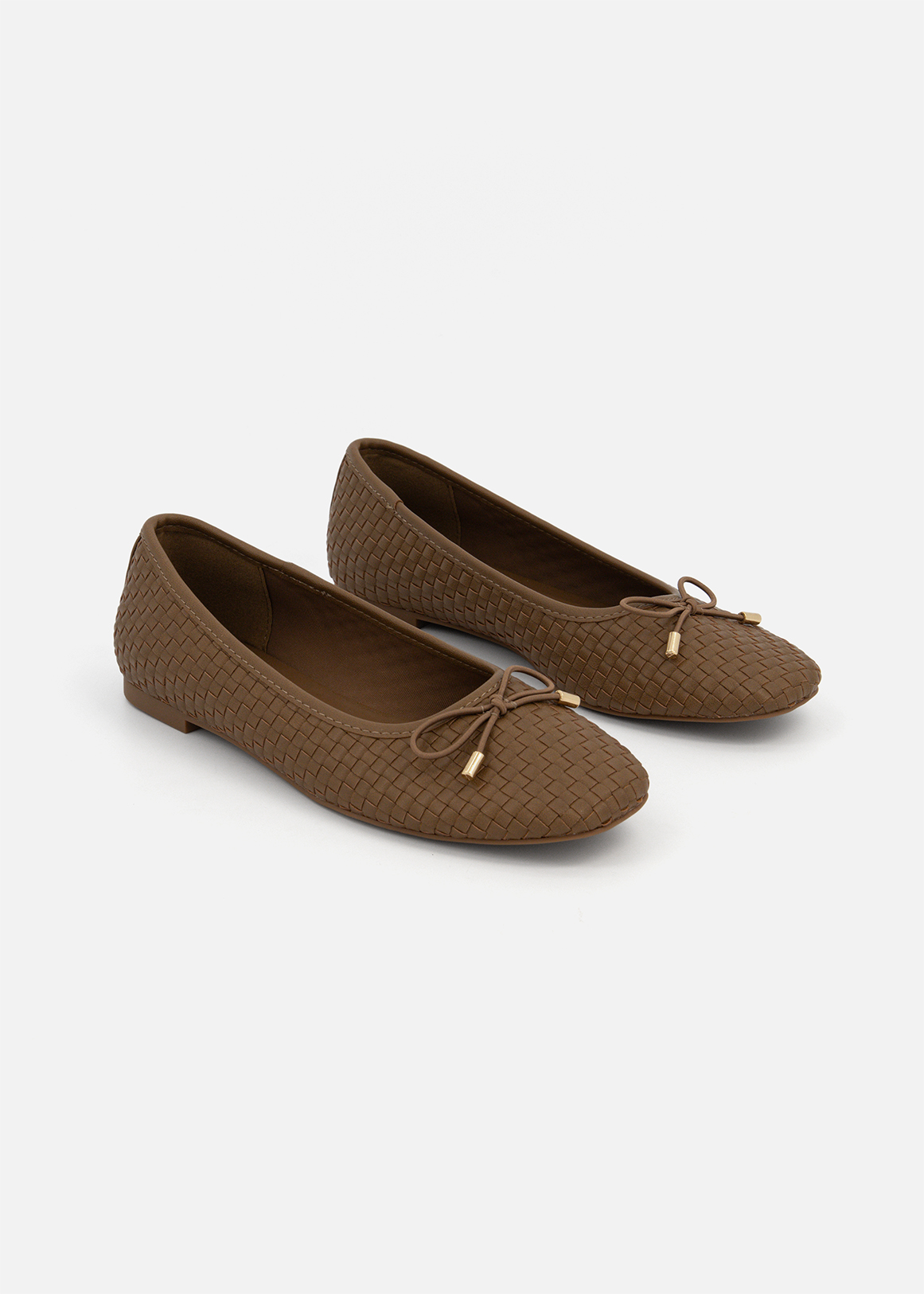 Bow Woven Pumps
