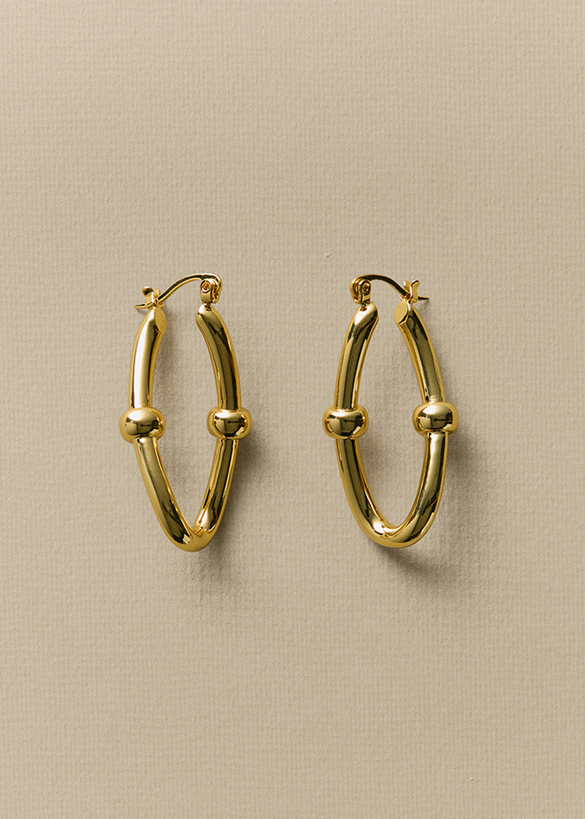 Signature Link Huggie Earrings