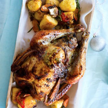 Roast turkey with pear stuffing and roast potatoes 
