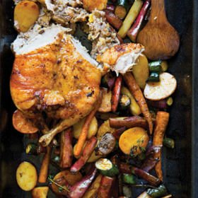 Spicy plum-and-apple free-range duck with roast baby vegetables